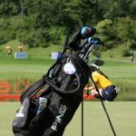 How to arrange golf clubs in a cart bag